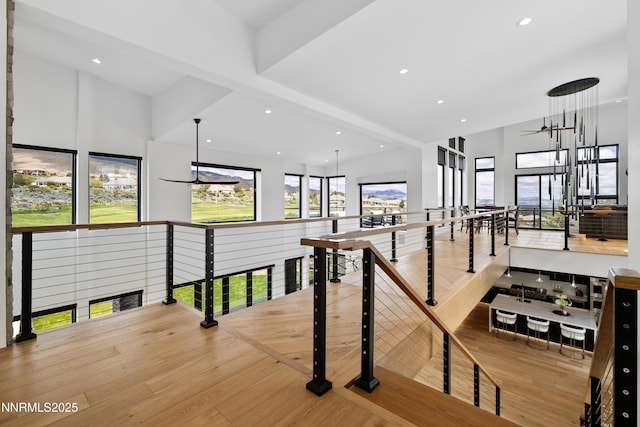 3041 Palmer Pointe Ct, Reno, NV 89511 - corridor featuring wood finished floors, recessed lighting, and an upstairs landing