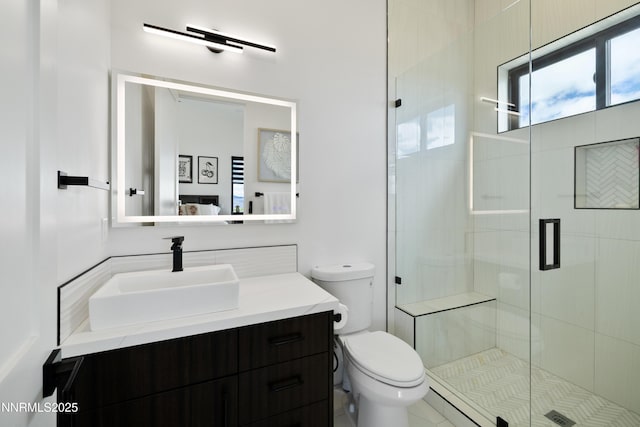 3041 Palmer Pointe Ct, Reno, NV 89511 - ensuite bathroom with toilet, vanity, and a shower stall