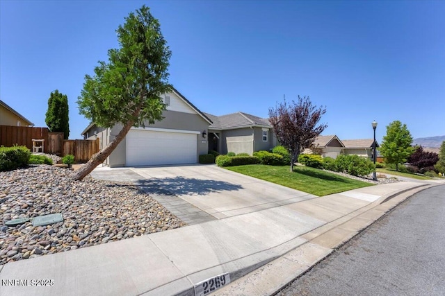 2269 Isabella Ct, Sparks, NV 89434 - view of front of house featuring driveway, stucco siding, and an attached garage
