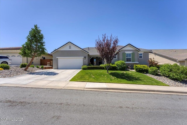 2269 Isabella Ct, Sparks, NV 89434 - single story home featuring a garage, stucco siding, a front yard, and driveway