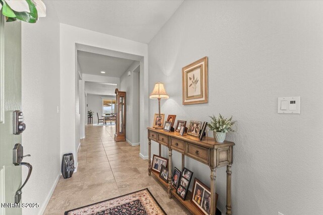 2269 Isabella Ct, Sparks, NV 89434 - hallway with baseboards and light tile patterned floors