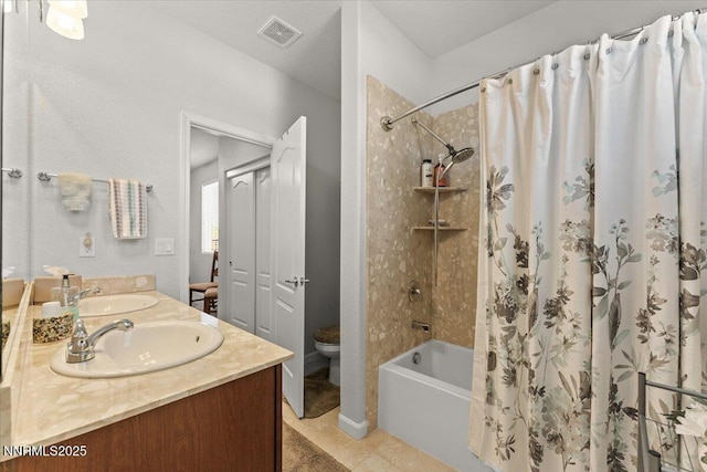 2269 Isabella Ct, Sparks, NV 89434 - full bath featuring toilet, shower / tub combo, double vanity, and tile patterned floors