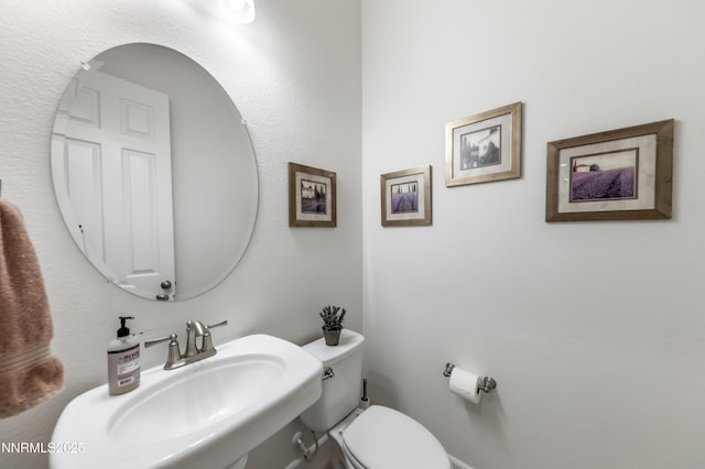332 Blooming Sage Way, Spanish Springs, NV 89441 - bathroom featuring a sink and toilet