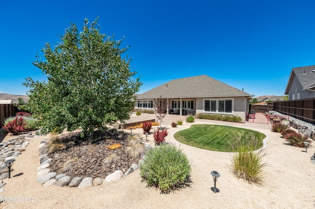 332 Blooming Sage Way, Spanish Springs, NV 89441 - rear view of property featuring a patio area and stucco siding