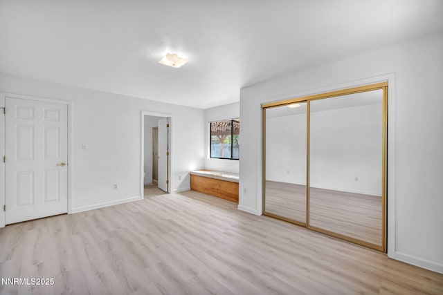 3803 Imperial Way, Carson City, NV 89706 - unfurnished bedroom with light wood finished floors, baseboards, a closet, and ensuite bathroom