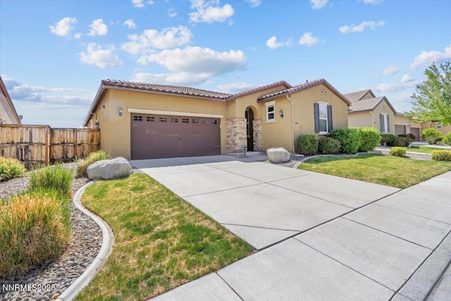 5345 Energystone Dr, Sparks, NV 89436 - mediterranean / spanish home featuring concrete driveway, stucco siding, an attached garage, and a tile roof