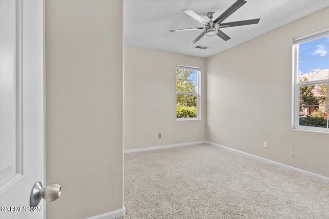 5345 Energystone Dr, Sparks, NV 89436 - unfurnished room featuring healthy amount of natural light, carpet, and a ceiling fan