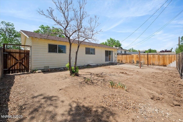 664 Beldon Way, Reno, NV 89503 - back of house with a fenced backyard and a gate