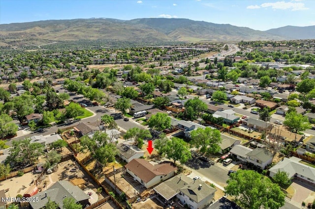 664 Beldon Way, Reno, NV 89503 - aerial perspective of suburban area with mountains