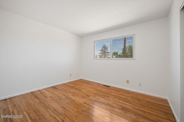 664 Beldon Way, Reno, NV 89503 - unfurnished room with light wood finished floors and baseboards