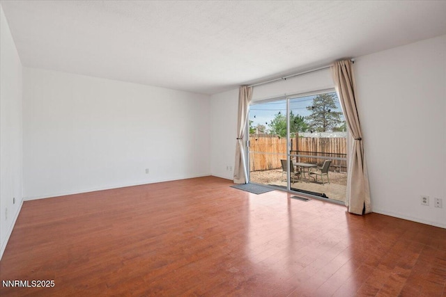 664 Beldon Way, Reno, NV 89503 - spare room with wood finished floors and baseboards
