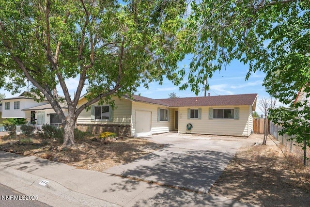 664 Beldon Way, Reno, NV 89503 - view of front of home with concrete driveway and brick siding