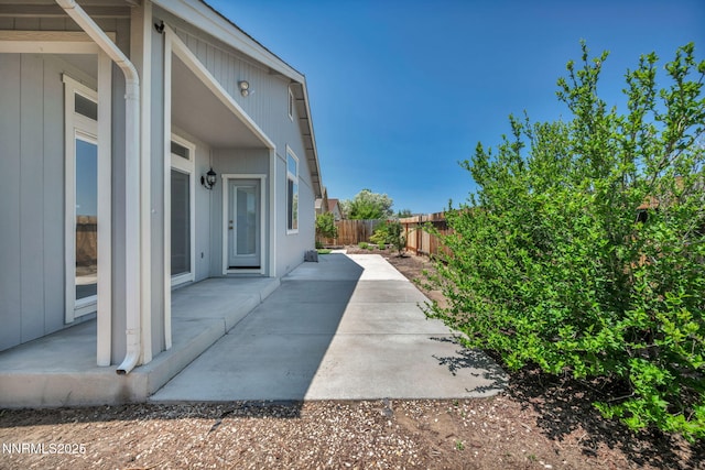 9951 Grand Falls Dr, Reno, NV 89506 - fenced backyard with a patio