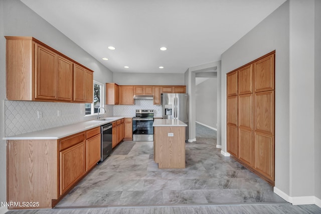9951 Grand Falls Dr, Reno, NV 89506 - kitchen featuring stainless steel appliances, baseboards, a sink, a center island, and recessed lighting