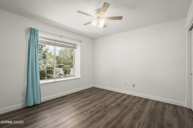 15 Sunlit Ct, Sparks, NV 89441 - empty room with dark wood-style flooring, baseboards, and ceiling fan