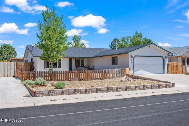 806 Bluerock Rd, Gardnerville, NV 89460 - ranch-style home with a garage, a fenced front yard, and concrete driveway