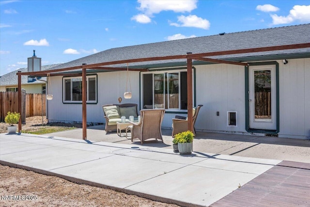 806 Bluerock Rd, Gardnerville, NV 89460 - rear view of property with a patio area and roof with shingles