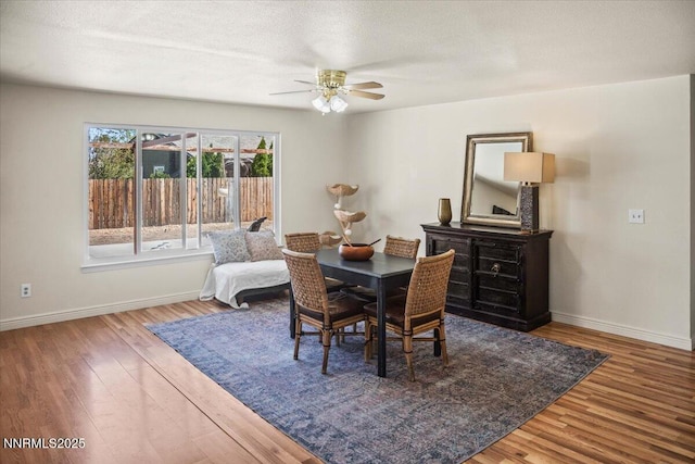 806 Bluerock Rd, Gardnerville, NV 89460 - dining room featuring a ceiling fan, baseboards, and wood finished floors