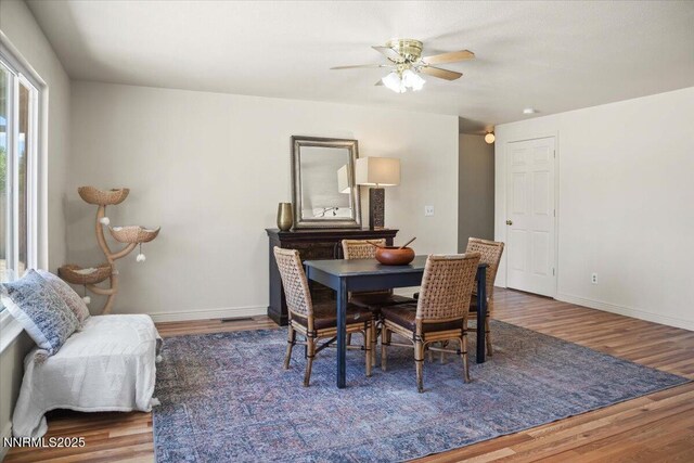 806 Bluerock Rd, Gardnerville, NV 89460 - dining space with wood finished floors, baseboards, and ceiling fan