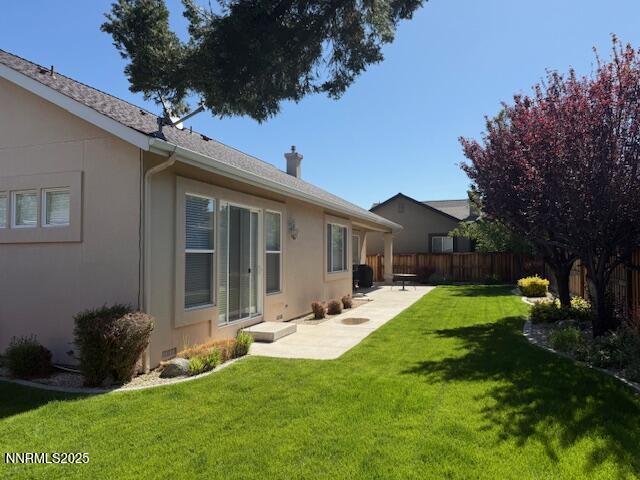 1313 Cedar Creek Cir, Gardnerville, NV 89460 - view of yard featuring a patio area