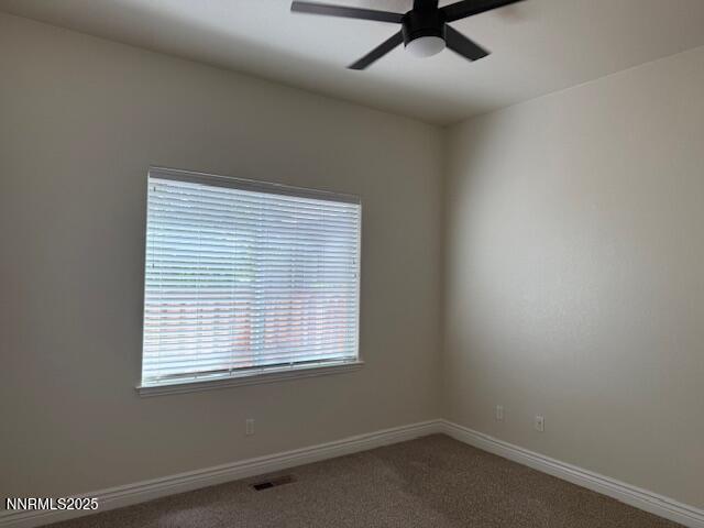 1313 Cedar Creek Cir, Gardnerville, NV 89460 - carpeted empty room with ceiling fan and baseboards