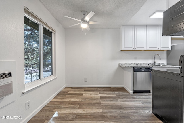 4608 Neil Rd Unit 226, Reno, NV 89502 - kitchen with stainless steel dishwasher, ceiling fan, white cabinets, light countertops, and a sink