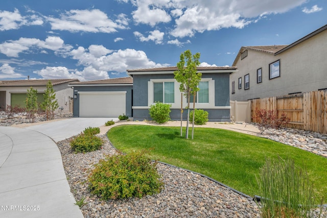14206 Tuscan Sun Ct, Reno, NV 89511 - ranch-style house with stucco siding, concrete driveway, and a garage