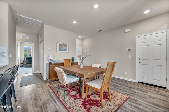 14206 Tuscan Sun Ct, Reno, NV 89511 - dining room featuring light wood-style floors and recessed lighting