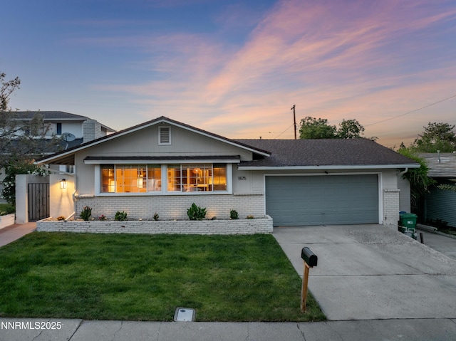 1875 Prince Way, Reno, NV 89503 - ranch-style house with brick siding, an attached garage, driveway, a front lawn, and a shingled roof