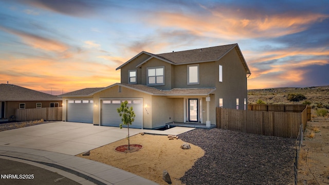 1318 Serenity Cir, Fernley, NV 89408 - traditional home with driveway, stucco siding, a shingled roof, and an attached garage