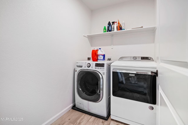 1318 Serenity Cir, Fernley, NV 89408 - laundry area with independent washer and dryer, light wood-style floors, and baseboards