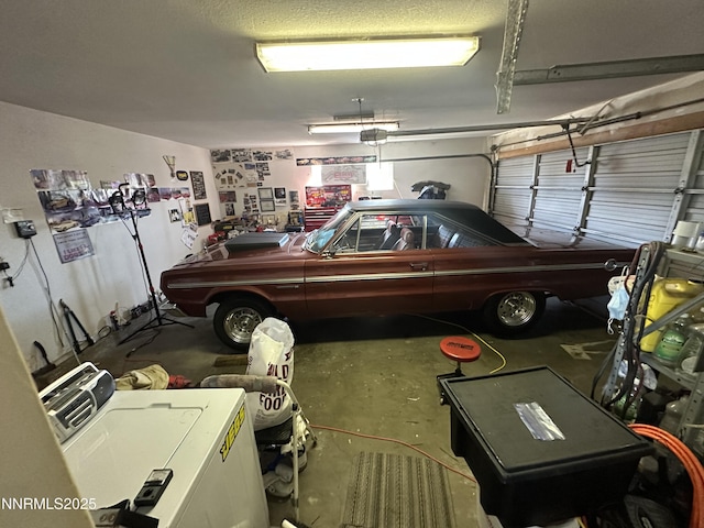1130 Spruce St, Gardnerville, NV 89410 - garage featuring a garage door opener and washer / clothes dryer