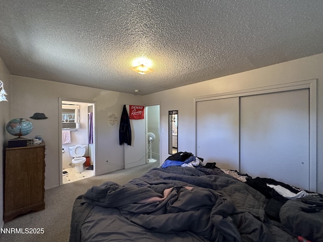 1130 Spruce St, Gardnerville, NV 89410 - bedroom with carpet flooring, a textured ceiling, a closet, and ensuite bath