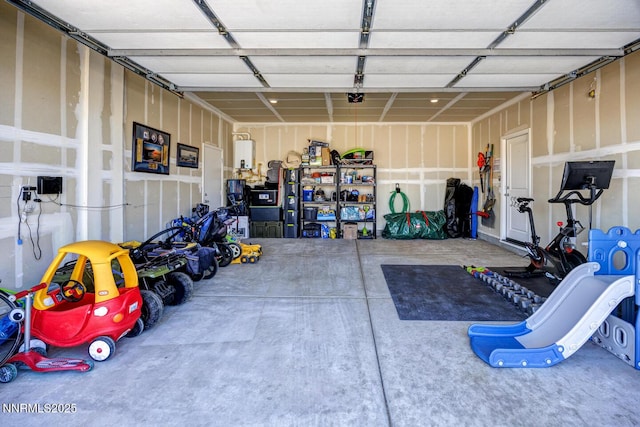 703 Sycamore Dr, Fallon, NV 89406 - garage featuring a garage door opener