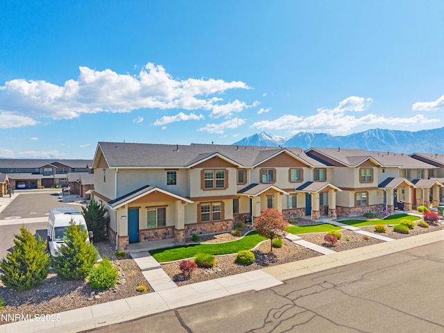 1170 Montevideo Cir, Minden, NV 89423 - view of property with a residential view, stucco siding, stone siding, and a mountain view