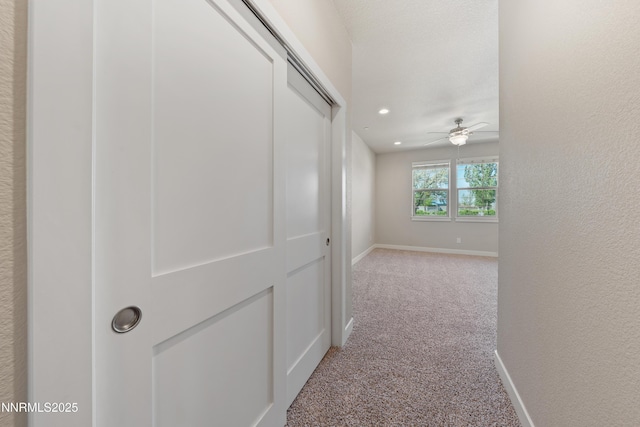 1170 Montevideo Cir, Minden, NV 89423 - corridor featuring carpet floors, baseboards, and recessed lighting