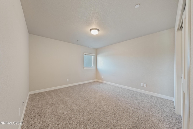 1170 Montevideo Cir, Minden, NV 89423 - unfurnished room featuring carpet flooring, baseboards, and a textured ceiling
