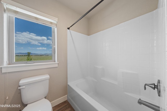 1170 Montevideo Cir, Minden, NV 89423 - full bath with toilet, baseboards, wood finished floors, and bathtub / shower combination