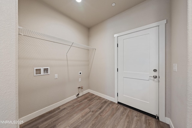 1170 Montevideo Cir, Minden, NV 89423 - laundry area with hookup for an electric dryer, gas dryer hookup, wood finished floors, baseboards, and recessed lighting