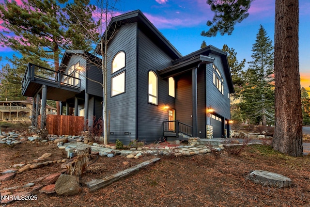 997 Dorcey Dr, Incline Village, NV 89451 - view of home's exterior with a garage and a balcony