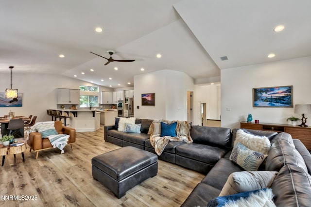 997 Dorcey Dr, Incline Village, NV 89451 - living area with vaulted ceiling, light wood-style flooring, ceiling fan, and recessed lighting