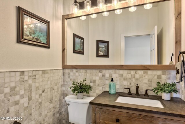 997 Dorcey Dr, Incline Village, NV 89451 - half bath featuring toilet, vanity, and tile walls