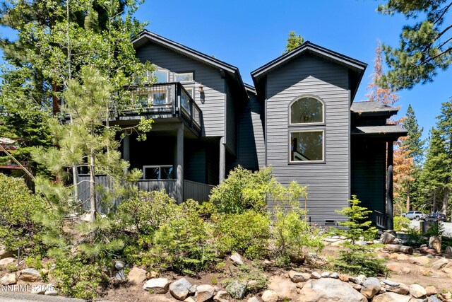 997 Dorcey Dr, Incline Village, NV 89451 - view of front facade with a balcony and crawl space