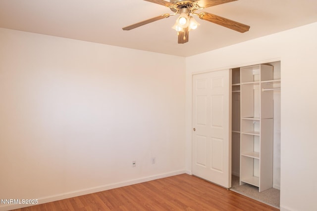 7344 Rubens Ct, Sun Valley, NV 89433 - unfurnished bedroom with light wood-type flooring, baseboards, a closet, and a ceiling fan