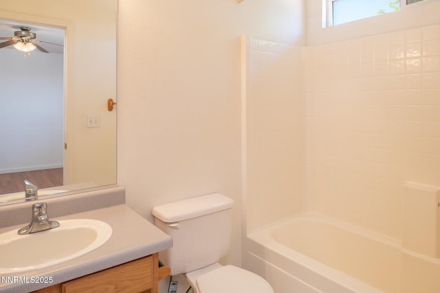 7344 Rubens Ct, Sun Valley, NV 89433 - full bath with vanity, ceiling fan, toilet, and shower / tub combination