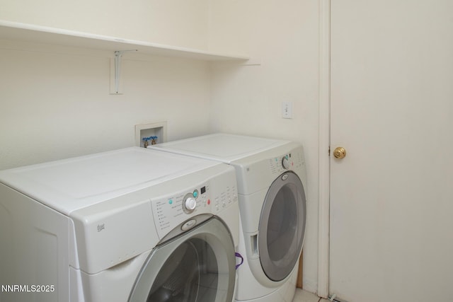 7344 Rubens Ct, Sun Valley, NV 89433 - laundry room featuring washer and dryer