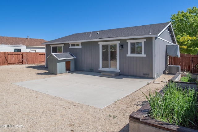 7344 Rubens Ct, Sun Valley, NV 89433 - rear view of house featuring a patio area, a fenced backyard, entry steps, and central AC unit