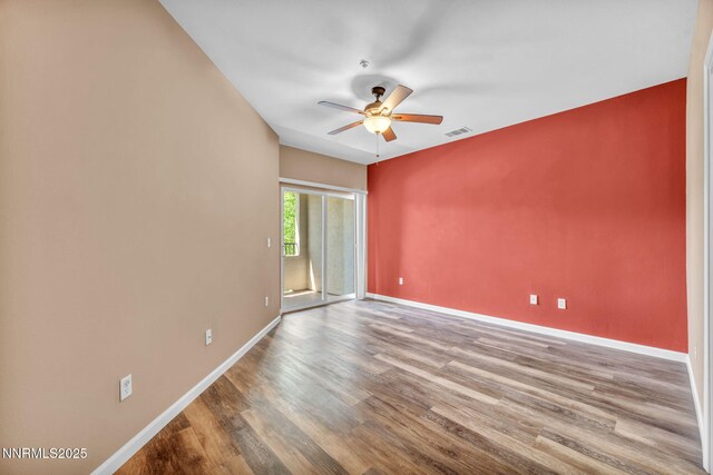 17000 Wedge Pkwy Unit 2624, Reno, NV 89511 - spare room with ceiling fan, wood finished floors, and baseboards