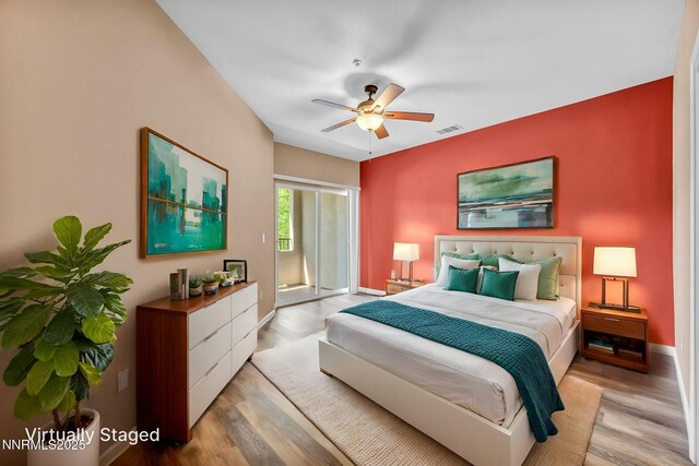 17000 Wedge Pkwy Unit 2624, Reno, NV 89511 - bedroom with wood finished floors, baseboards, access to exterior, and ceiling fan