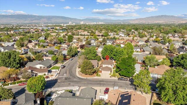 2731 Wabash Cir, Sparks, NV 89434 - aerial view of property and surrounding area featuring mountains and nearby suburban area
